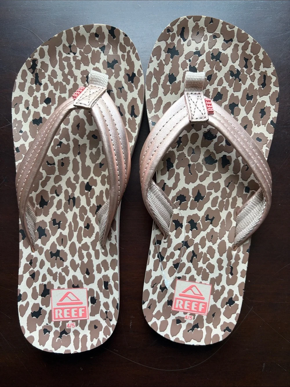 Reef Kids Leopard Print Flip Flops in Brown and Black